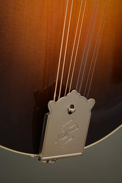 Engraved Northfield tailpiece on the Big Mon mandolin's lower top