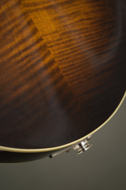 Close-up of the flame maple figure on the Big Mon mandolin's back