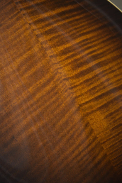 Close-up of the flame maple figure on the Big Mon mandolin's lower back