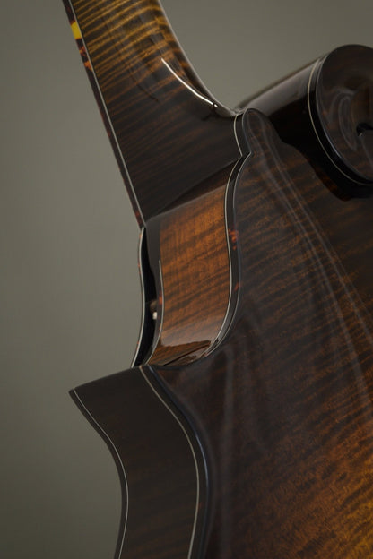 Back of the Big Mon mandolin's scroll and neck heel with tortoise binding