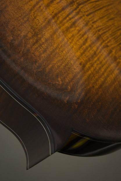 Body point and tortoise binding on the back of the Big Mon mandolin