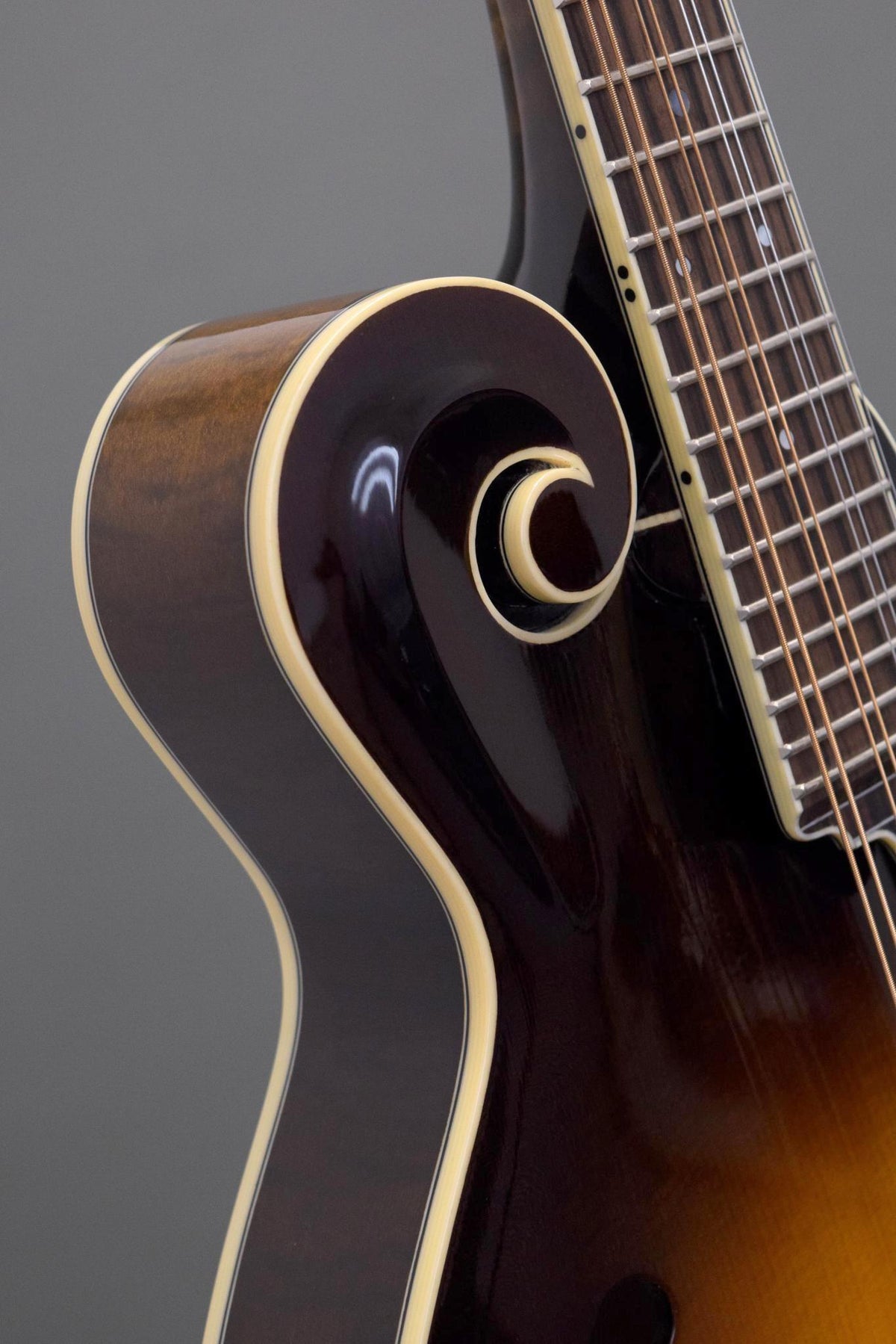 Carved scroll and ivoroid binding on the Northfield Big Mon mandolin