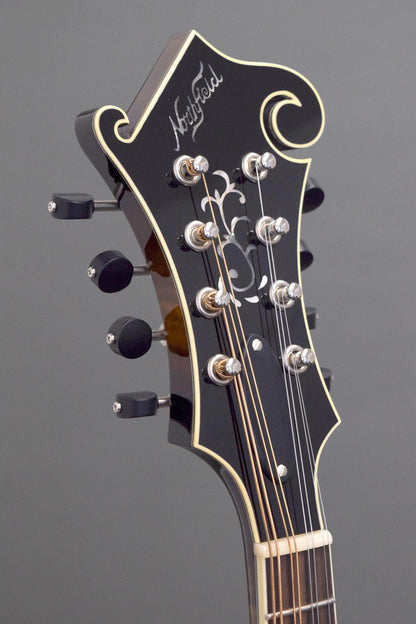 Headstock of the Northfield Big Mon mandolin with pearl floral inlay