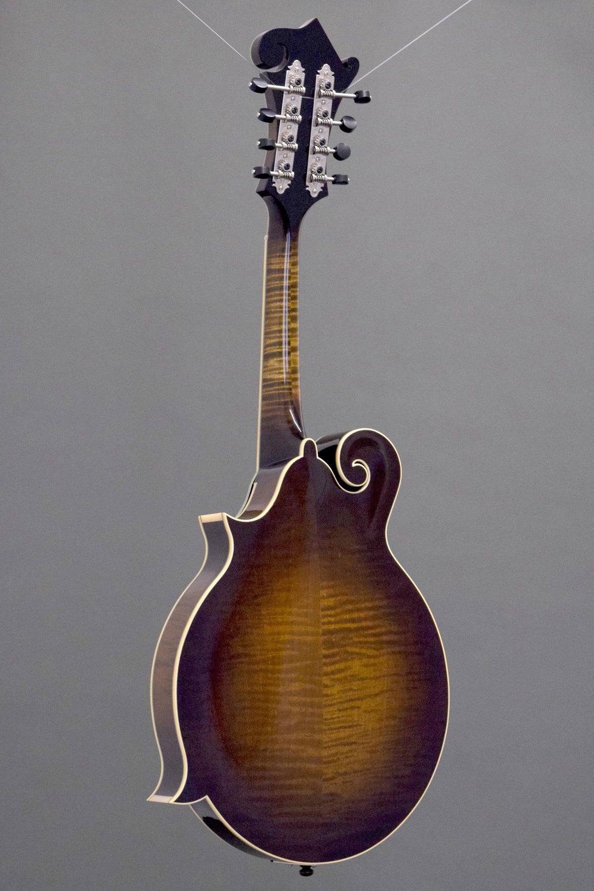 Full back view of the Northfield Big Mon mandolin, flame maple back in sunburst
