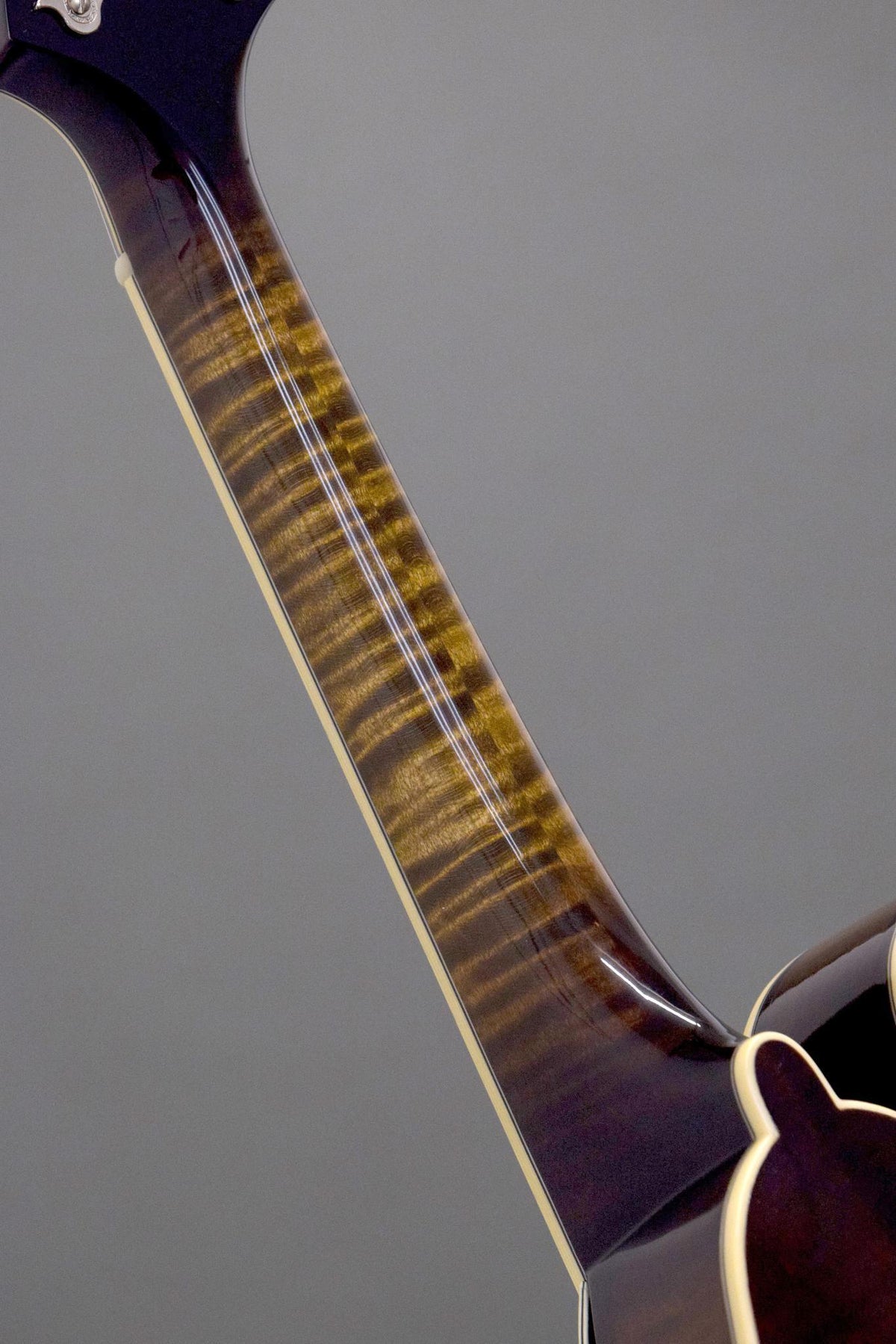 Flame maple neck back on the Northfield Big Mon mandolin