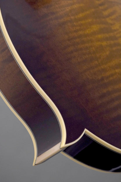Ivoroid binding at the body point of the Northfield Big Mon mandolin