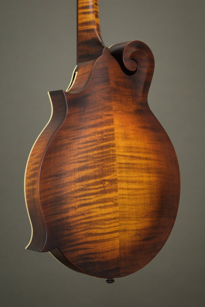 Flame maple back of the F2S oval hole mandolin, angled view