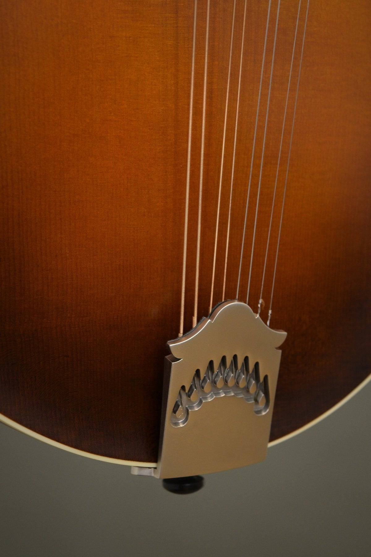 Northfield tailpiece and lower top of the F5S mandolin in Light Leatherburst