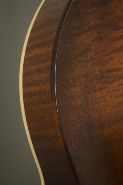 Flame maple rim and binding along the F5S mandolin's body curve