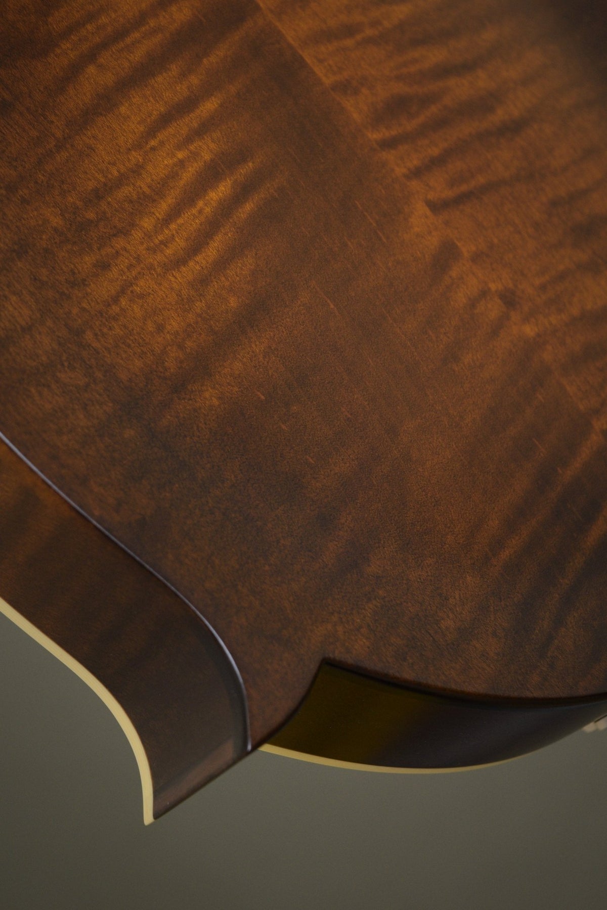 Body point and ivoroid binding on the back of the F5S mandolin