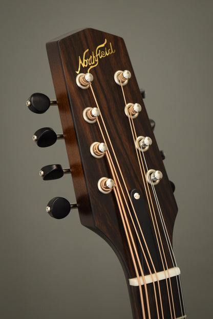 Headstock of the Northfield Wavelength octave mandolin with gold Northfield logo