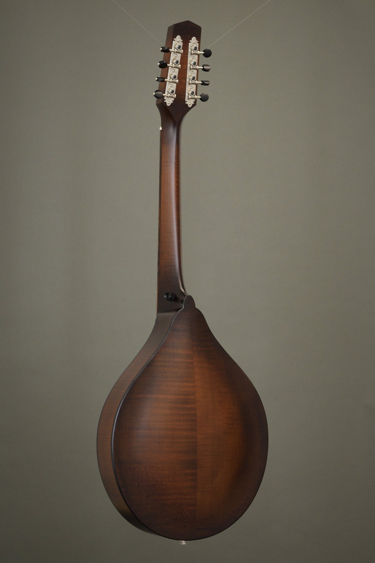 Full back view of the Northfield Wavelength octave mandolin in figured maple